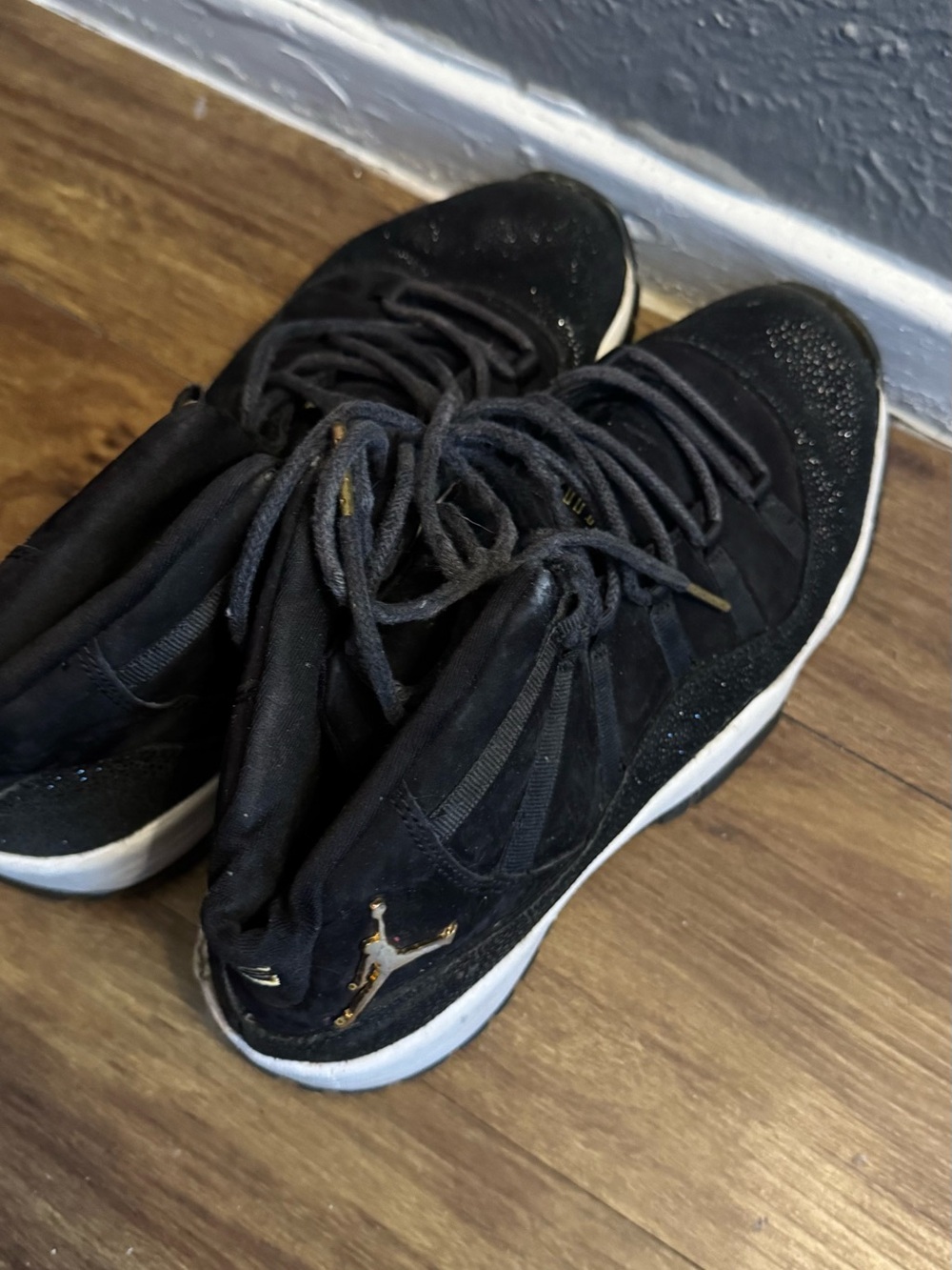 Jordan Black High-Top Sneakers with Gold Jumpman Accents